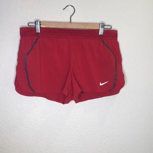 Red Nike shorts